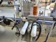 Etiquetadora autom�tica para botellas y tarros cil�ndricos planos Maqmundi