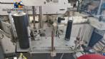 Etiquetadora automtica de doble cabezal para botellas planas Bauch Campos