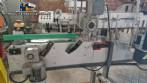 Etiquetadora automtica de doble cabezal para botellas planas Bauch Campos