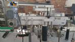 Etiquetadora autom�tica de doble cabezal para botellas planas Bauch Campos