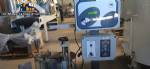 Etiquetadora automtica autoadhesiva para botellas cilndricas