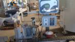 Etiquetadora automtica autoadhesiva para botellas cilndricas