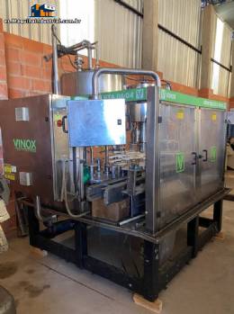 Llenadora rotativa gravimtrica de acero inoxidable con cabina