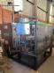 Llenadora rotativa gravimtrica de acero inoxidable con cabina