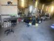 Llenadora rotativa gravimtrica de acero inoxidable con cabina