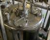 Llenadora rotativa gravim�trica de acero inoxidable con cabina