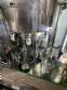 Llenadora rotativa gravim�trica de acero inoxidable con cabina
