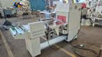 Selladora de envases en forma de L con t�nel de retracci�n semiautom�tico.