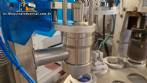 M�quina rotativa de acero inoxidable para llenado, dosificaci�n y sellado, con junta de aluminio, para tarros, vasos y botellas Delgo.