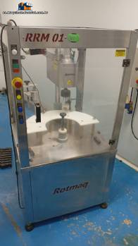 M�quina taponadora de rosca Rotmaq con elevador de posicionamiento de tapones