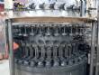 Llenadora rotativa CompoMaq con 42 boquillas y tapadora de rosca