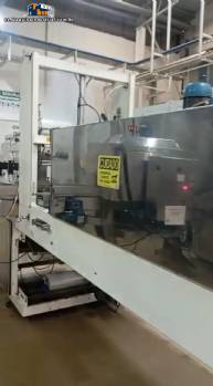Mquina etiquetadora con tnel de vapor para mangas y prensa de botellas