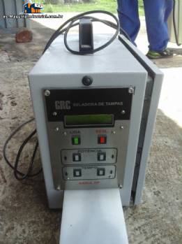 Sellador por inducci�n para tapas GRC