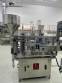 Llenadora dosificadora volum�trica con selladora y taponadora en acero inoxidable Delgo 2000 botes por hora